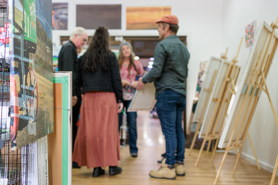 People looking at an artwork